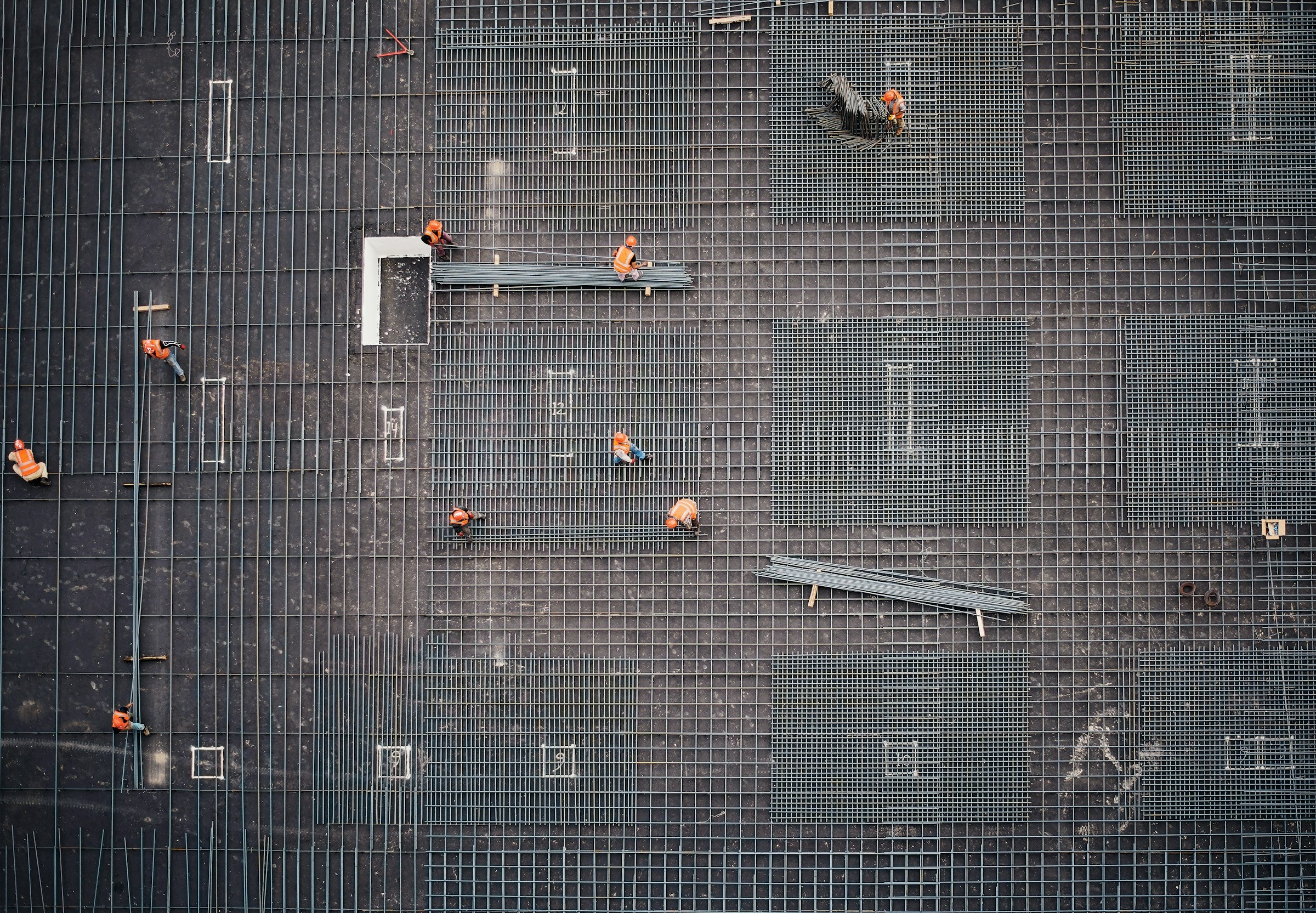 aerial photo of people on a construction site